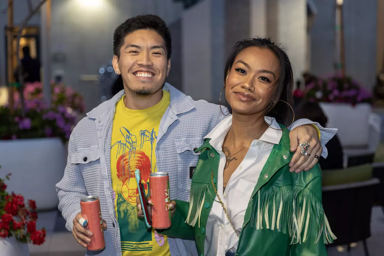 2 people smile for a picture